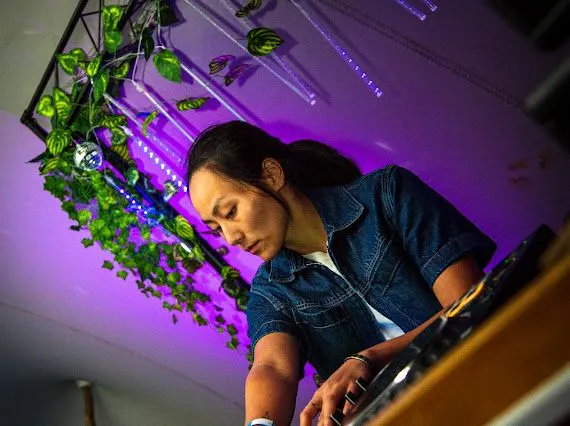 Purple lit DJ performance